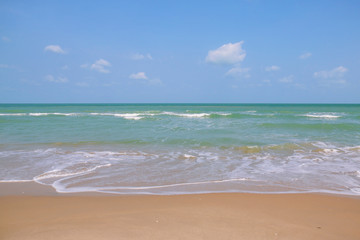 Beautiful  sea waves sand and sky with tropical beach in  Thailand.Summer holiday background.