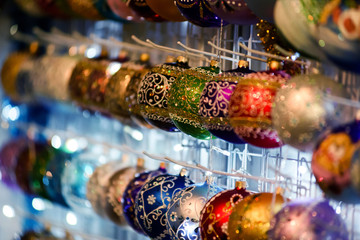 Vibrant Christmas background with the new year toys and decorations. Christmas orbs.