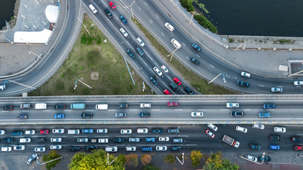 Aerial top view of road junction from above, automobile traffic and jam of many cars,...