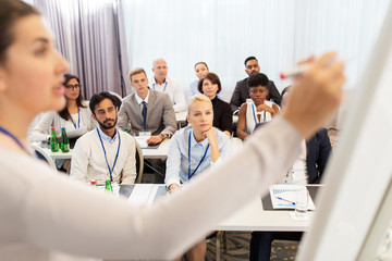 group of people at business conference or lecture