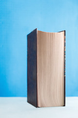 the book is hardcover on blue background