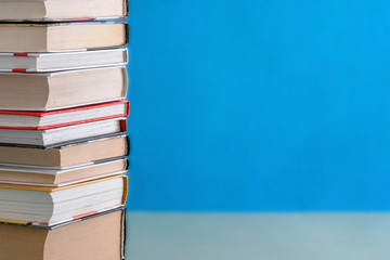 a stack of books of various sizes