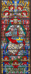 LONDON, GREAT BRITAIN - SEPTEMBER 16, 2017: The stained glass of Jesus Christ the Pantokrator in church St Etheldreda by Joseph Edward Nuttgens (1952).