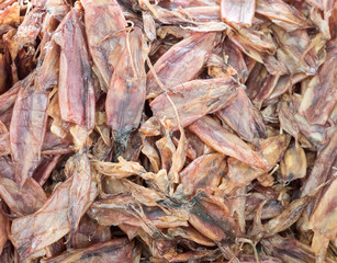 Dried squid pile for sale.
