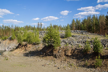 Abandoned flooded open pit quarry mine chromite ore with water