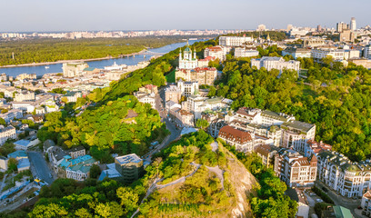 Aerial top view of Saint Andrew's church and Andreevska street from above, cityscape of Podol...