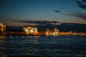 Night cityscape, river and Avrora or Aurora in St. Petersburg