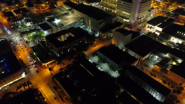 Aerial drone video Miami Beach at night city illuminated 4k