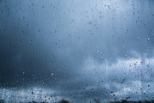 Rain drop on glass, Water drop background on glass with rainy