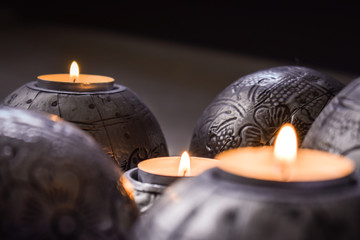 Candles burning, cozy home decoration