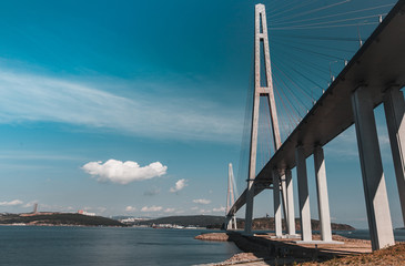 The long, handsome cable-stayed bridge on the island is Russian. Beautiful background