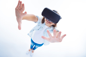 Joyful positive girl being in 3d reality