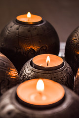 Candles burning, cozy home decoration