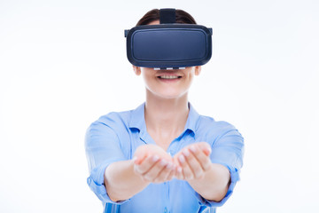 Happy nice woman being in virtual reality