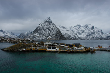 Village in front of the turquoise sea of the Lofoten Islands