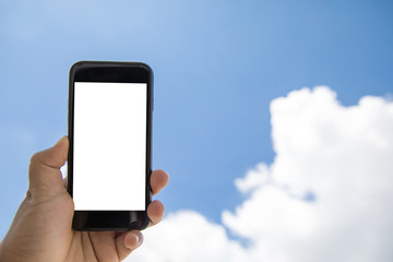 Asian man holding phone on street using gadget lift up at environment sky show screen advertising isolated