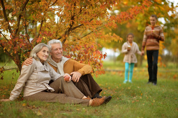 senior couple in autumnal park