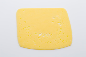 Cheese slices on the white background.