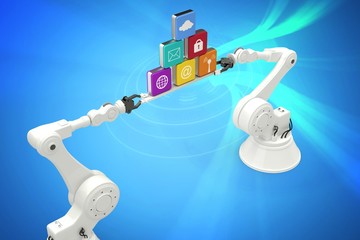 Composite image of robotic hands holding multi colored computer