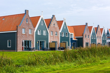Volendam is a town in North Holland in the Netherlands. Colored houses of marine park in Volendam. North Holland, Netherlands..
