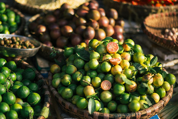 rosy green lemon market in morning sunlight in asia