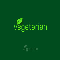 Vegetarian logo. Letters with a green leaf on a dark background.
