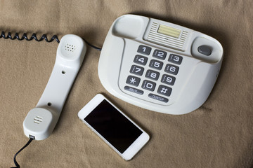 Phones old and modern. Old telephone and mobile,concepts compare new and old technologies.
