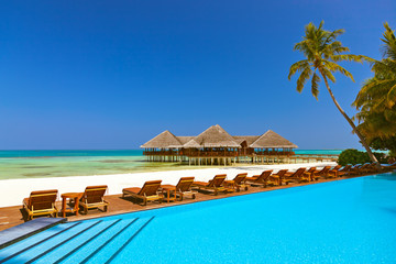 Pool and cafe on Maldives beach