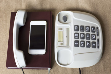 Phones old and modern. Old telephone and mobile,concepts compare new and old technologies.