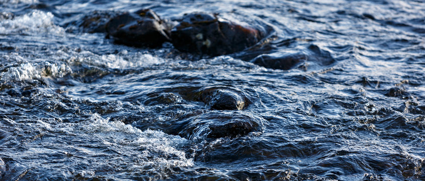 Rapid Stream Of A Mountain River