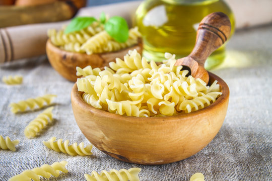 Helix- or corkscrew-shaped pasta. Rotini macaroni. Related to fusilli, but has a tighter helix, i.e. with a smaller pitch