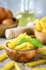 Penne rigate. Macaroni in the form of feathers. mostaccioli pasta