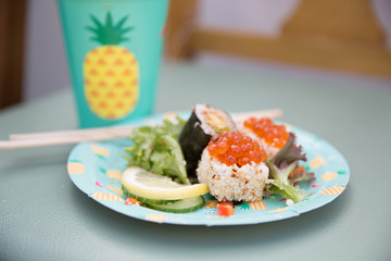 Close-up plate with food and cup on the table