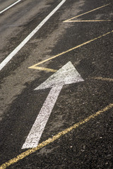 Arrow on asphalt