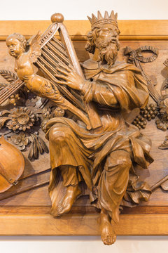 LONDON, GREAT BRITAIN - SEPTEMBER 18, 2017: The carved statue and relief of king David in church St Botolph's Aldgate by unknown artist of 18. cent.