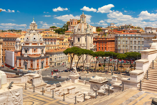 Fototapeta Piazza Venezia, Ancient ruins of Trajan Forum, Trajan Column and churches Santa Maria di Loreto and Most Holy Name of Mary as seen from Altar of the Fatherland in Rome, Italy