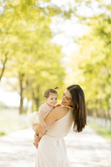 Young woman with baby girl