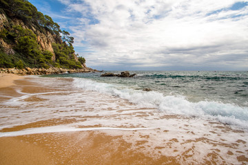     Sea surf on the beach of Santa Cristina in Lloret de Mar,Spain 