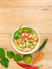 Chicken and spicy chili with green curry in coconut milk