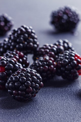 Organic blackberries on a stone table