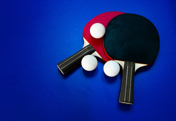 Table tennis rackets. Top view of table tennis racket lying on the tennis table