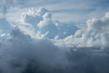 Blue sky and clouds subject is blurred.
