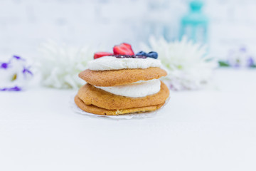 Flowers with whoopie pies. Honey cake.