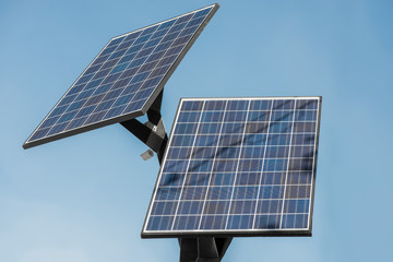 Solar Panels Against The Deep Blue Sky