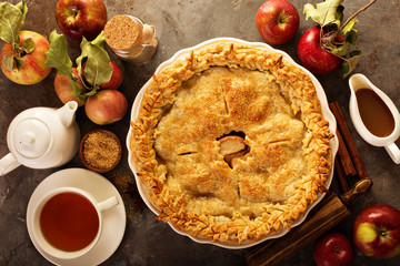Apple pie decorated with fall leaves