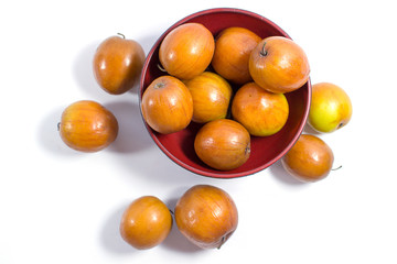 Jujube fruits close up on white background.
