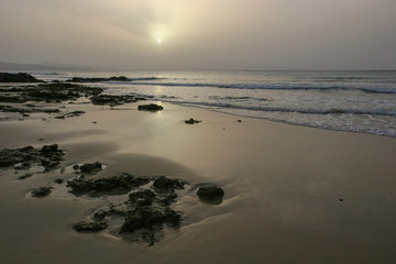 Magnificent deserted beach with black sand at sunrise, Fuerteventura, Canary Islands, Spain