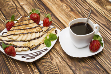 Crepes with bananas and cream