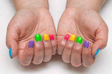 festive blue, purple, light green, green, yellow, pink manicure on short square nails
