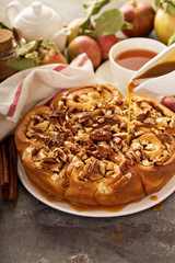 Cinnamon rolls with apples, caramel and pecan